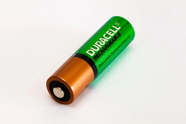 A single Duracell rechargeable battery on a white background.