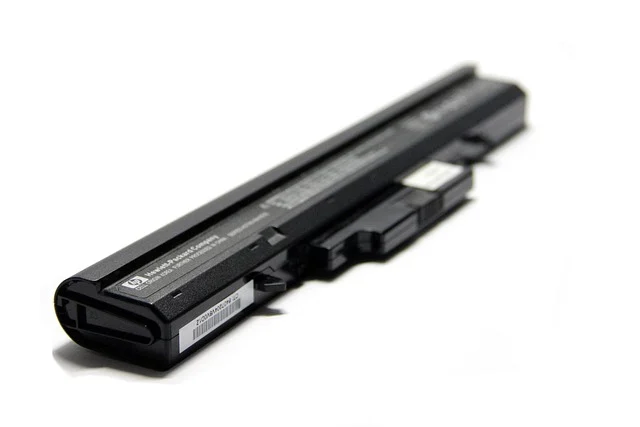 How many batteries for 5000 watt inverter: A black laptop battery on a white background.