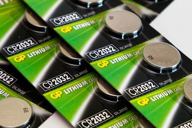 Blister packs of CR2032 lithium coin cell batteries.